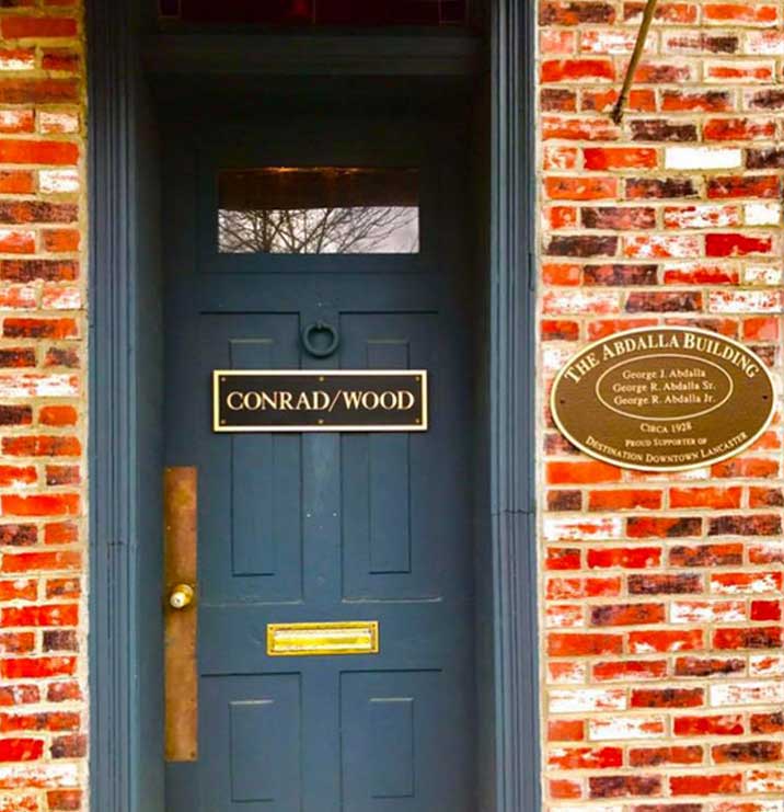Conrad Wood Door The Abdalla Building